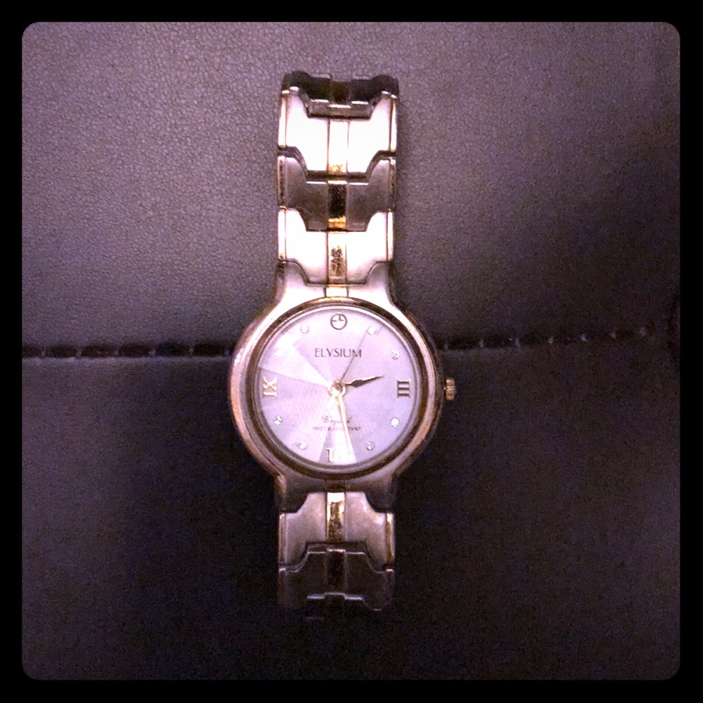 Vintage Elysium Stainless Steel Back Watch